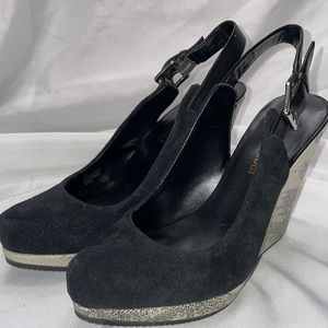 LUXURY REBEL BLACK SLING BACK
PLATFORM WEDGE, SIZE 7 1/2 PRE OWNED EXCELLENT